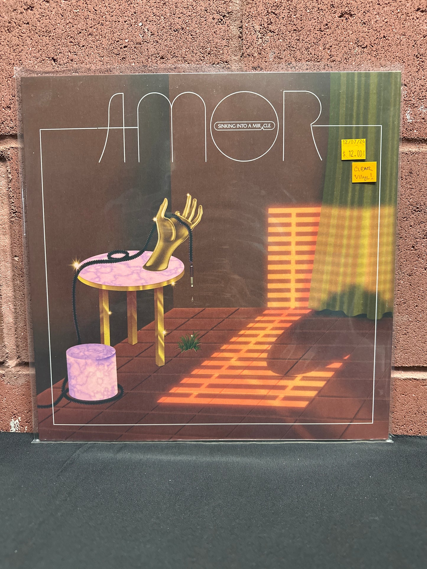 Used Vinyl:  AMOR  ”Sinking Into A Miracle” LP + CD (Clear vinyl)