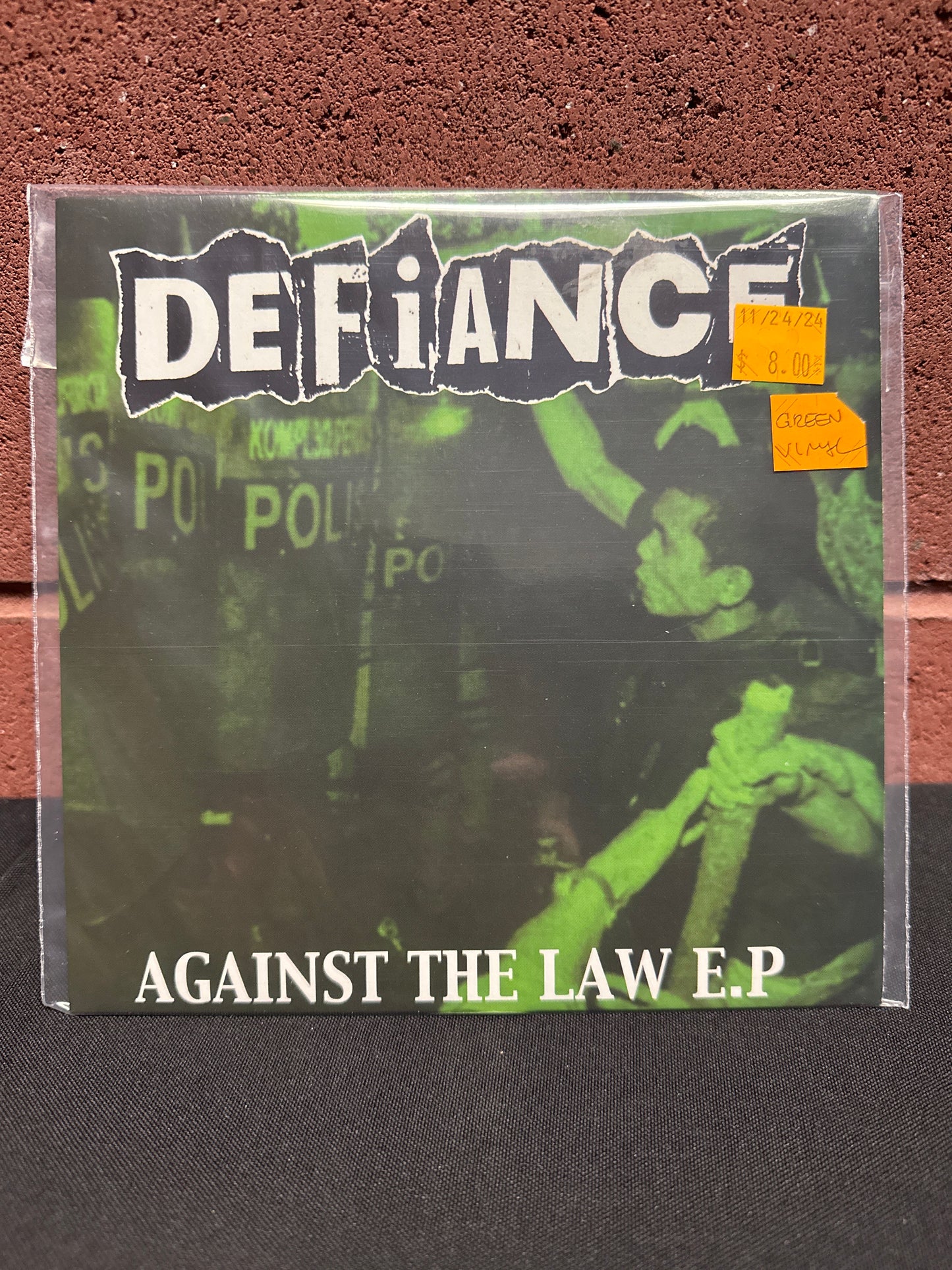 Used Vinyl:  Defiance ”Against The Law E.P” 7" (Green vinyl)