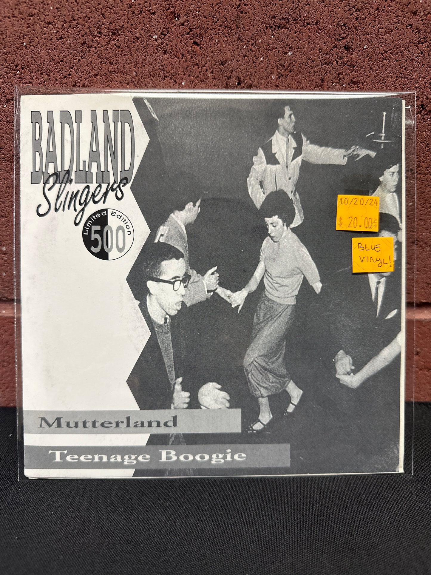 Used Vinyl:  Badland Slingers ”Mutterland / Teenage Boogie” 7" (Blue Vinyl)