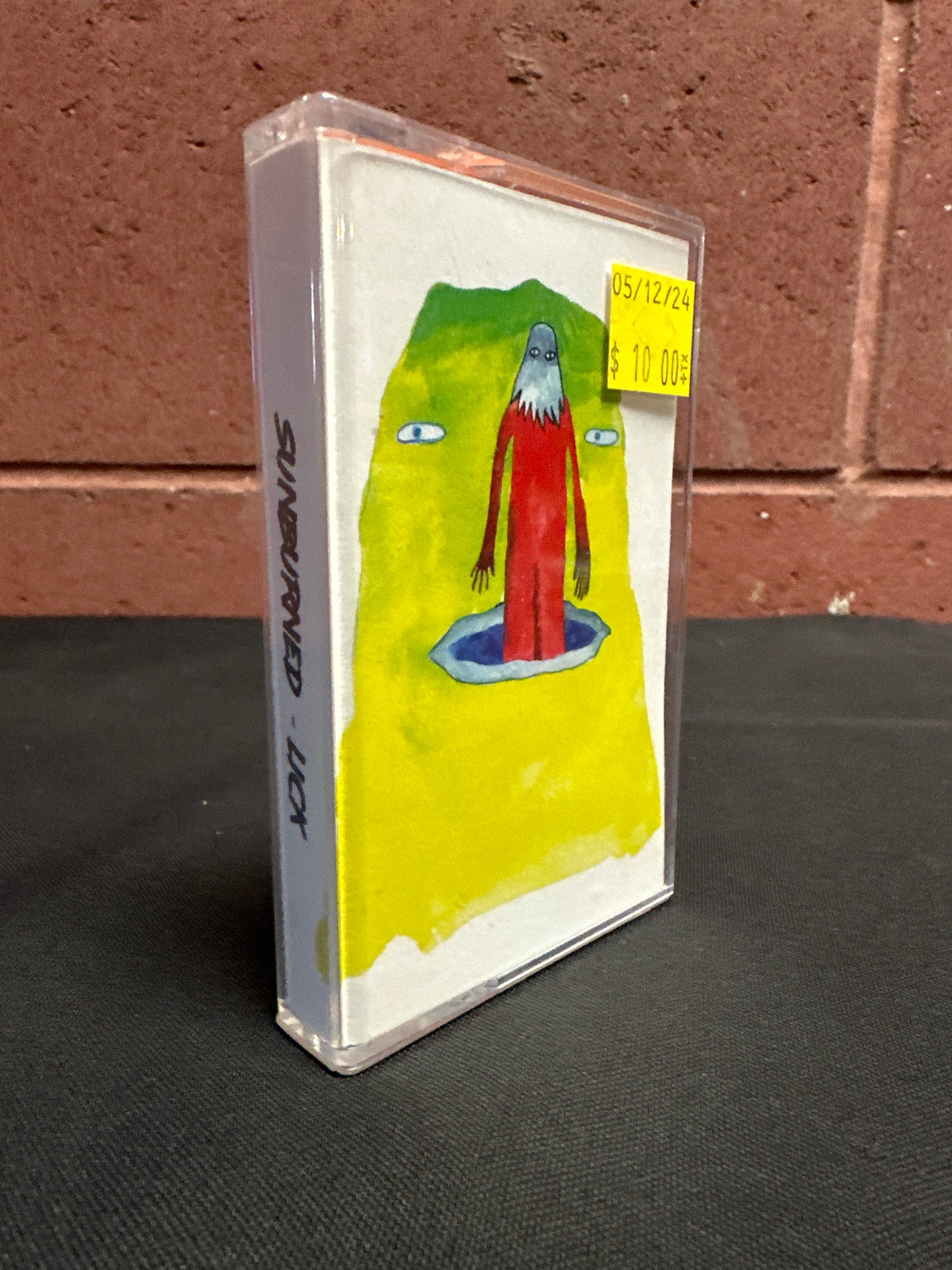 Used Cassette: Sunburned "Lick" Tape