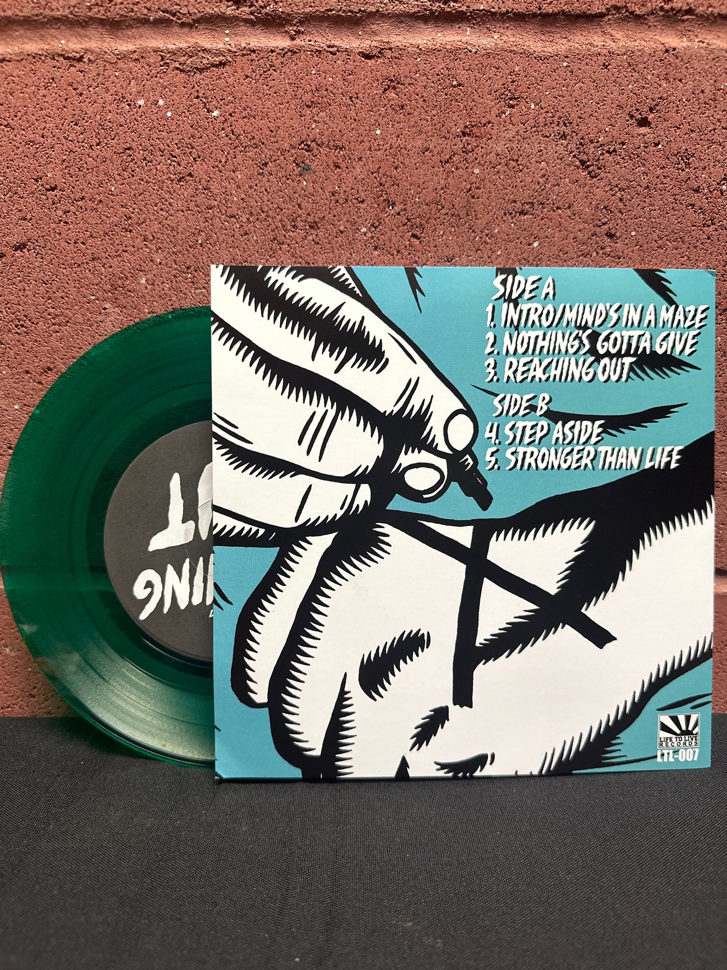 Used Vinyl:  Step Aside ”Reaching Out” 7" (Green vinyl)