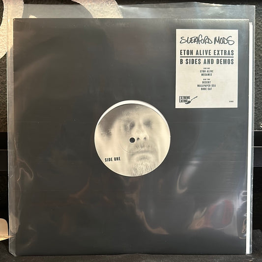 Used Vinyl:  Sleaford Mods ”Eton Alive Extras B Sides And Demos” 12" (White vinyl)