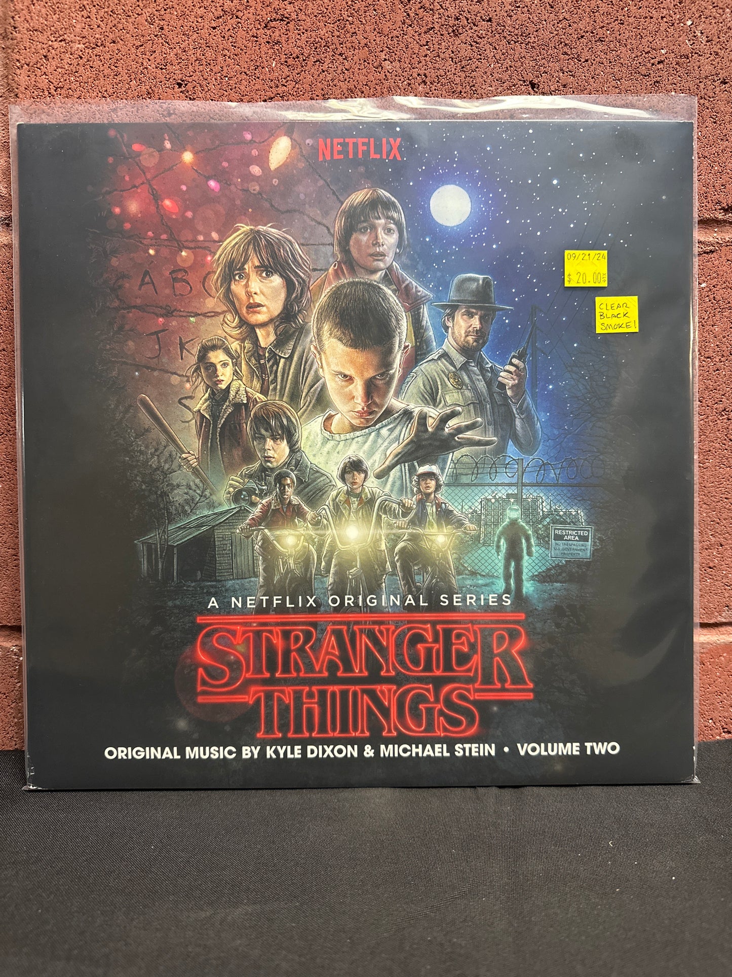 Used Vinyl:  Kyle Dixon, Michael Stein ”Stranger Things - Volume One (A Netflix Original Series)” 2xLP (Clear with black smoke vinyl)