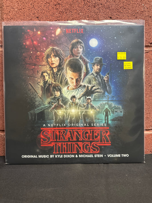 Used Vinyl:  Kyle Dixon, Michael Stein ”Stranger Things - Volume One (A Netflix Original Series)” 2xLP (Clear with black smoke vinyl)