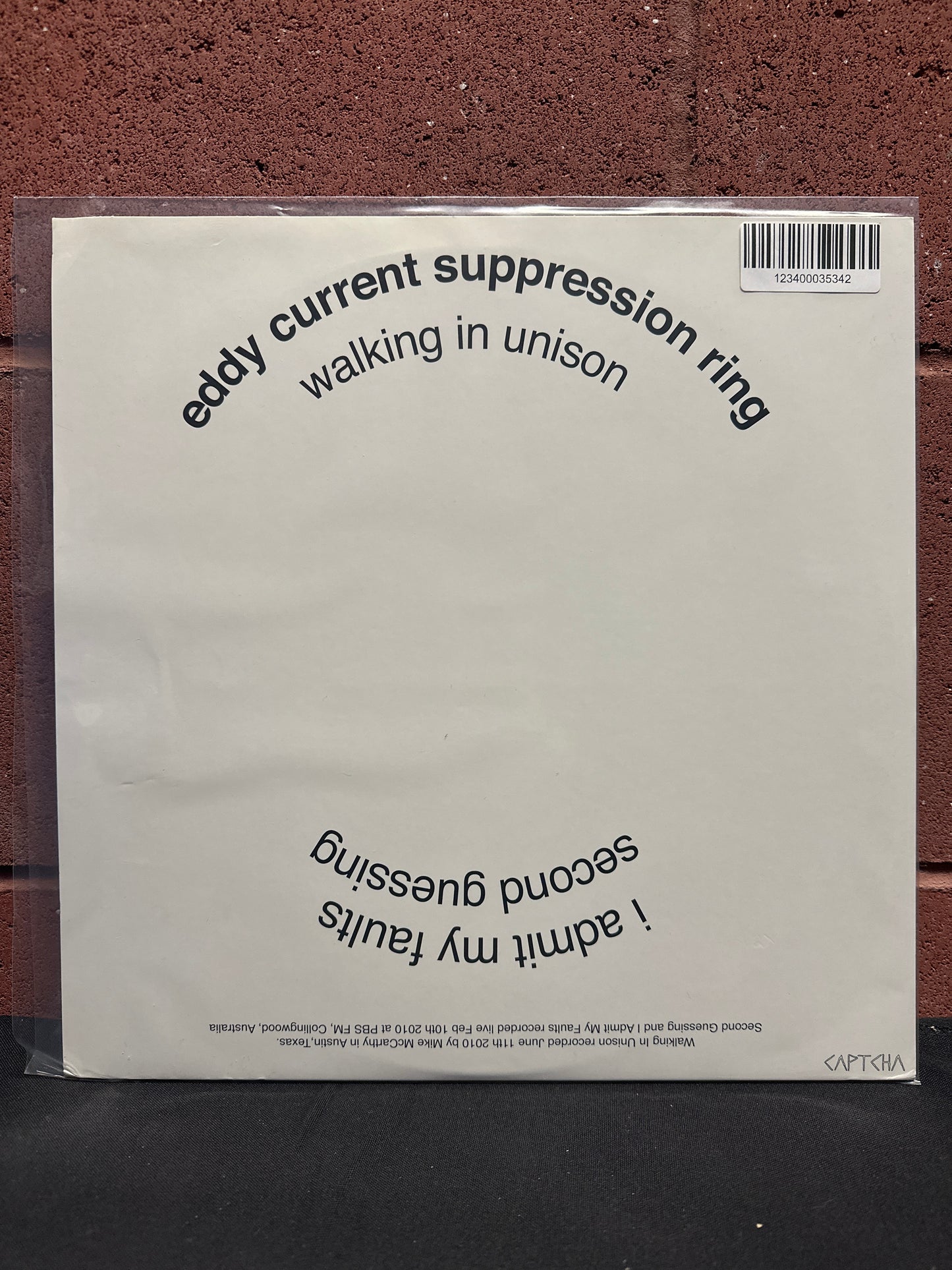 Used Vinyl:  Eddy Current Suppression Ring ”Walking In Unison” 12"