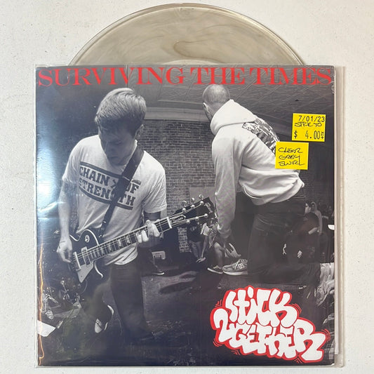 USED VINYL: Stick Together “Surviving The Times” 7" (Clear/Grey Swirl)