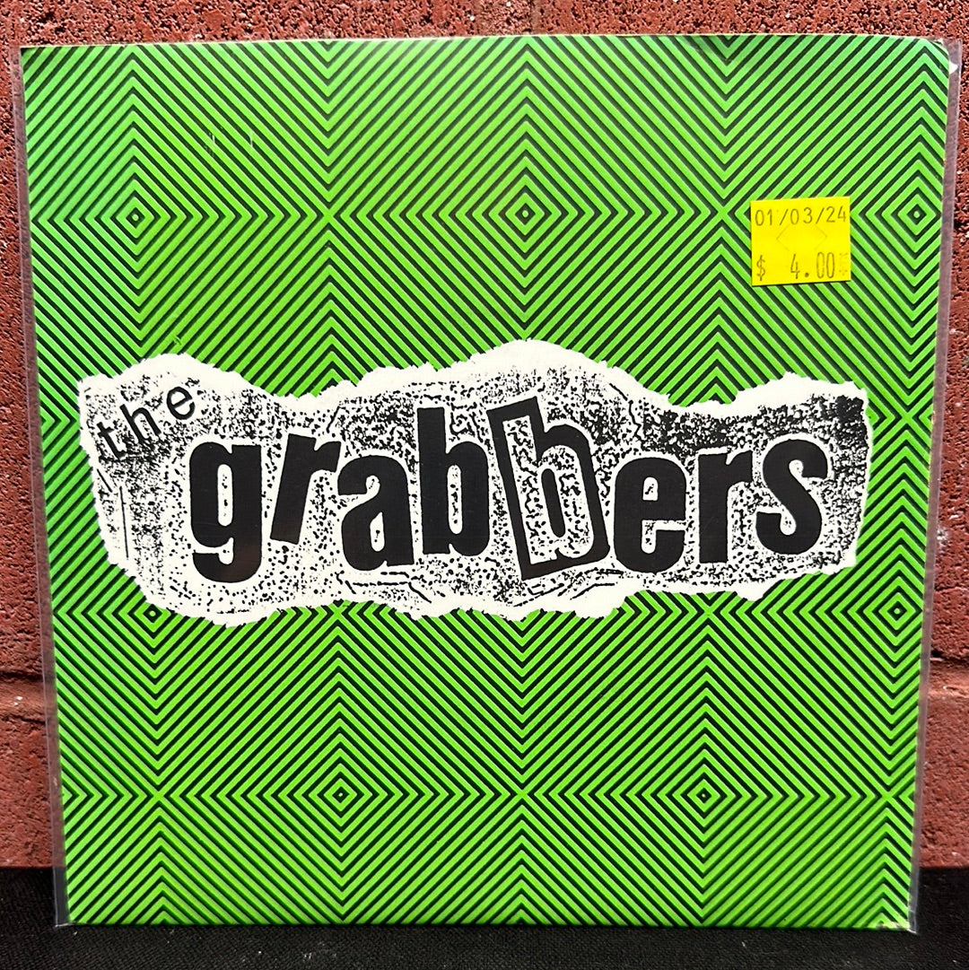 Used Vinyl:  The Grabbers ”Huntington Beach Vs. The World” 7"