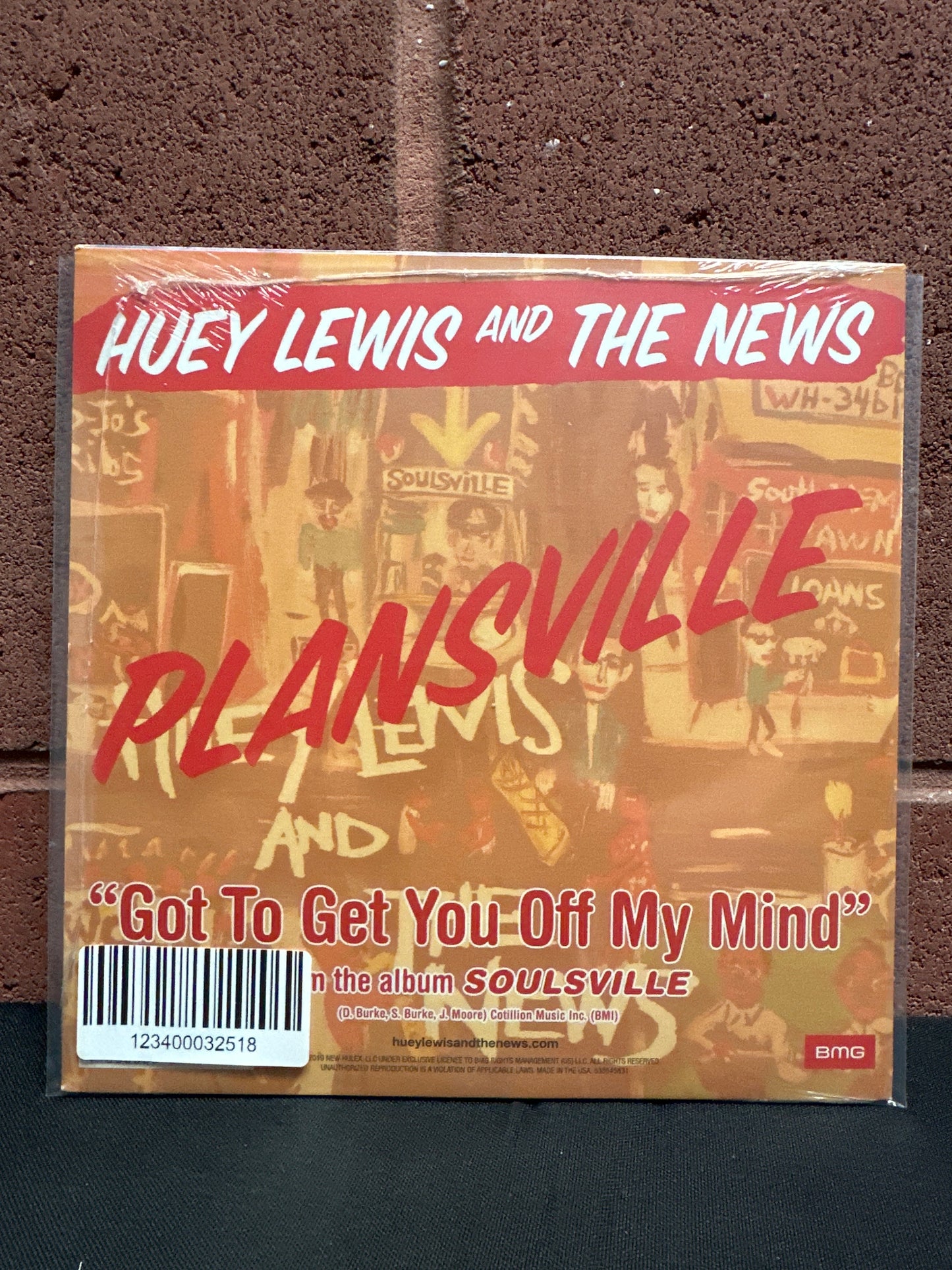 Used Vinyl:  Huey Lewis & The News ”Plansville” 7"