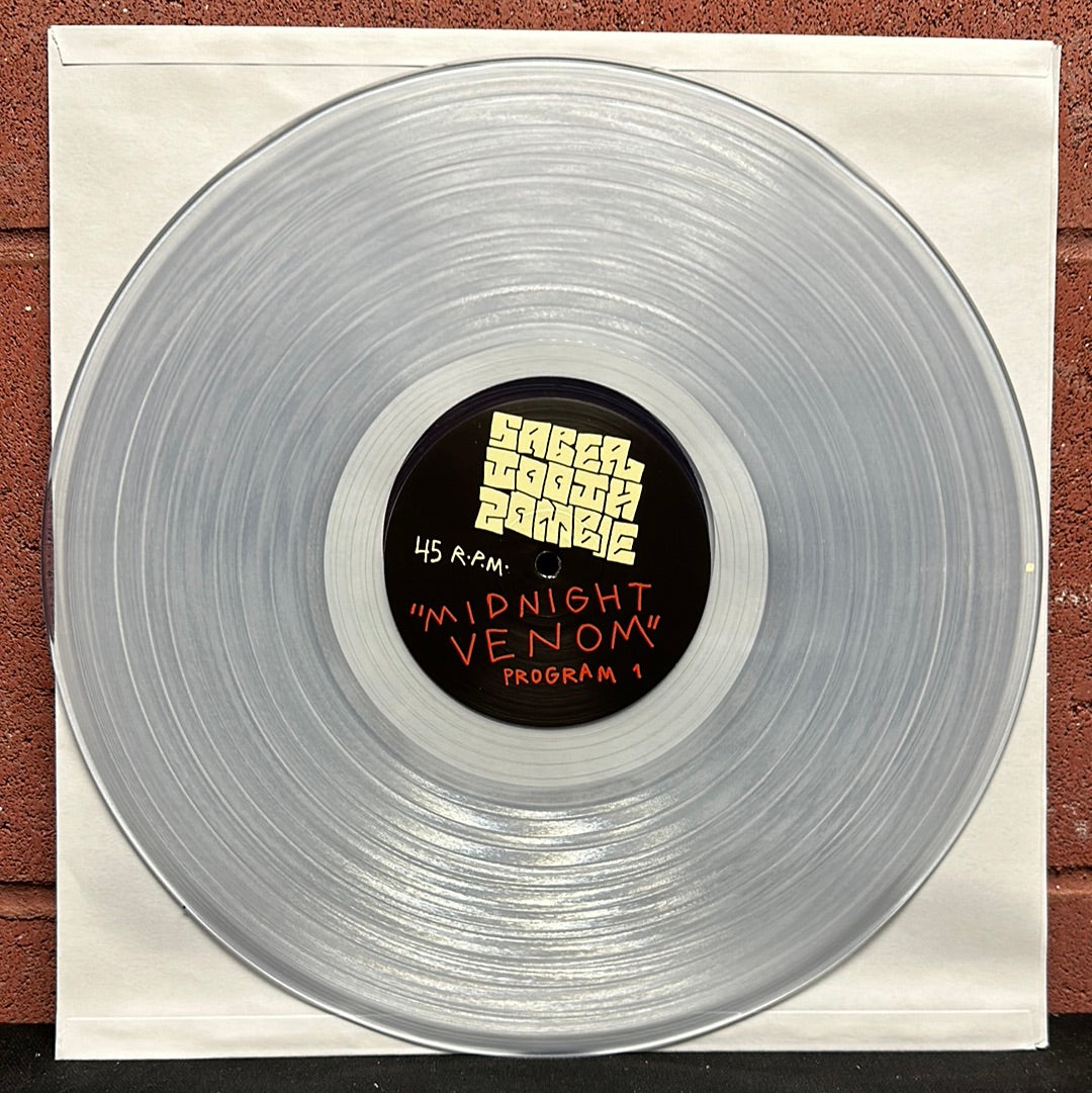 Used Vinyl:  Sabertooth Zombie ”Midnight Venom ” 12" (Clear vinyl)