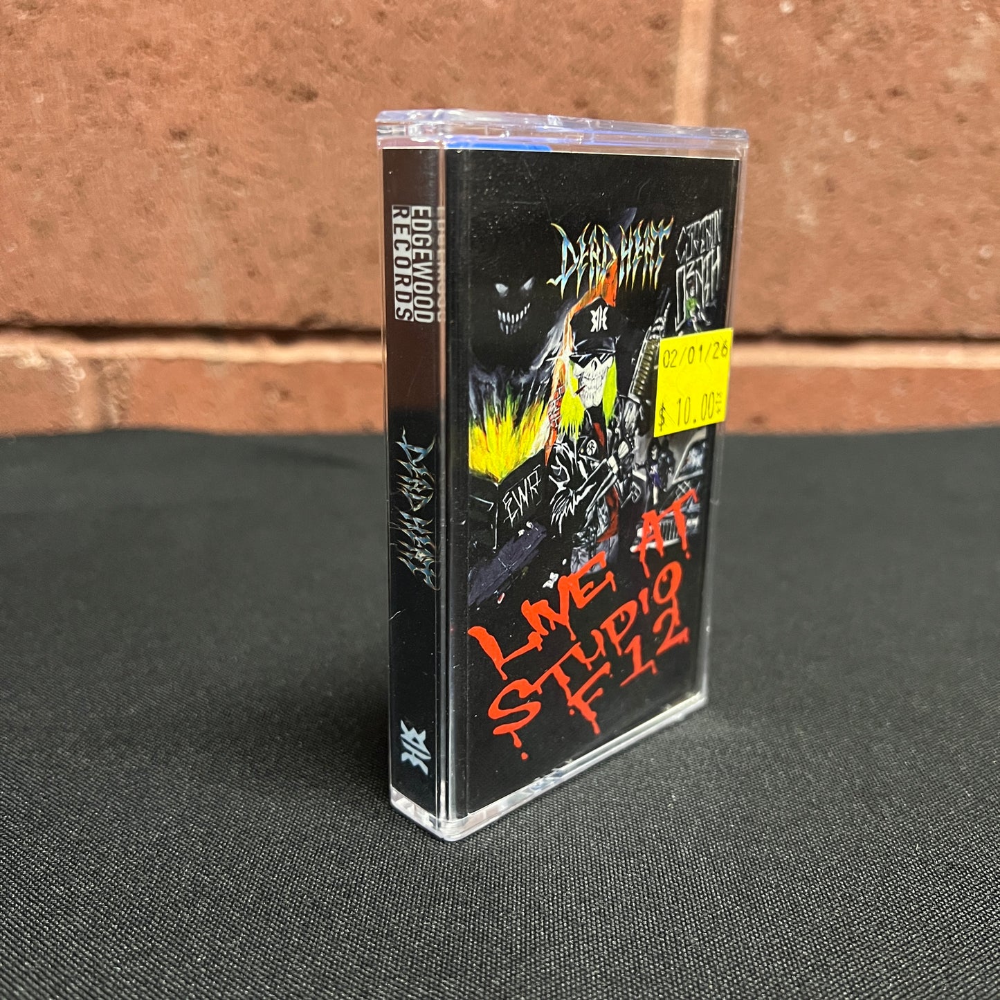 Used Cassette: Dead Heat "Live At Studio F12" Tape
