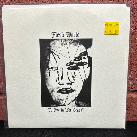 Used Vinyl:  Flesh World ”A Line In Wet Grass” 7"