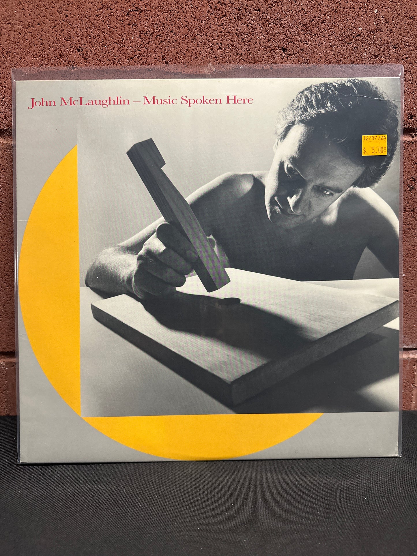 Used Vinyl:  John McLaughlin ”Music Spoken Here” LP