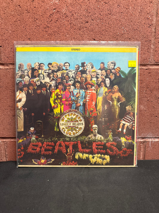 Used Vinyl:  The Beatles ”Sgt. Pepper's Lonely Hearts Club Band” LP