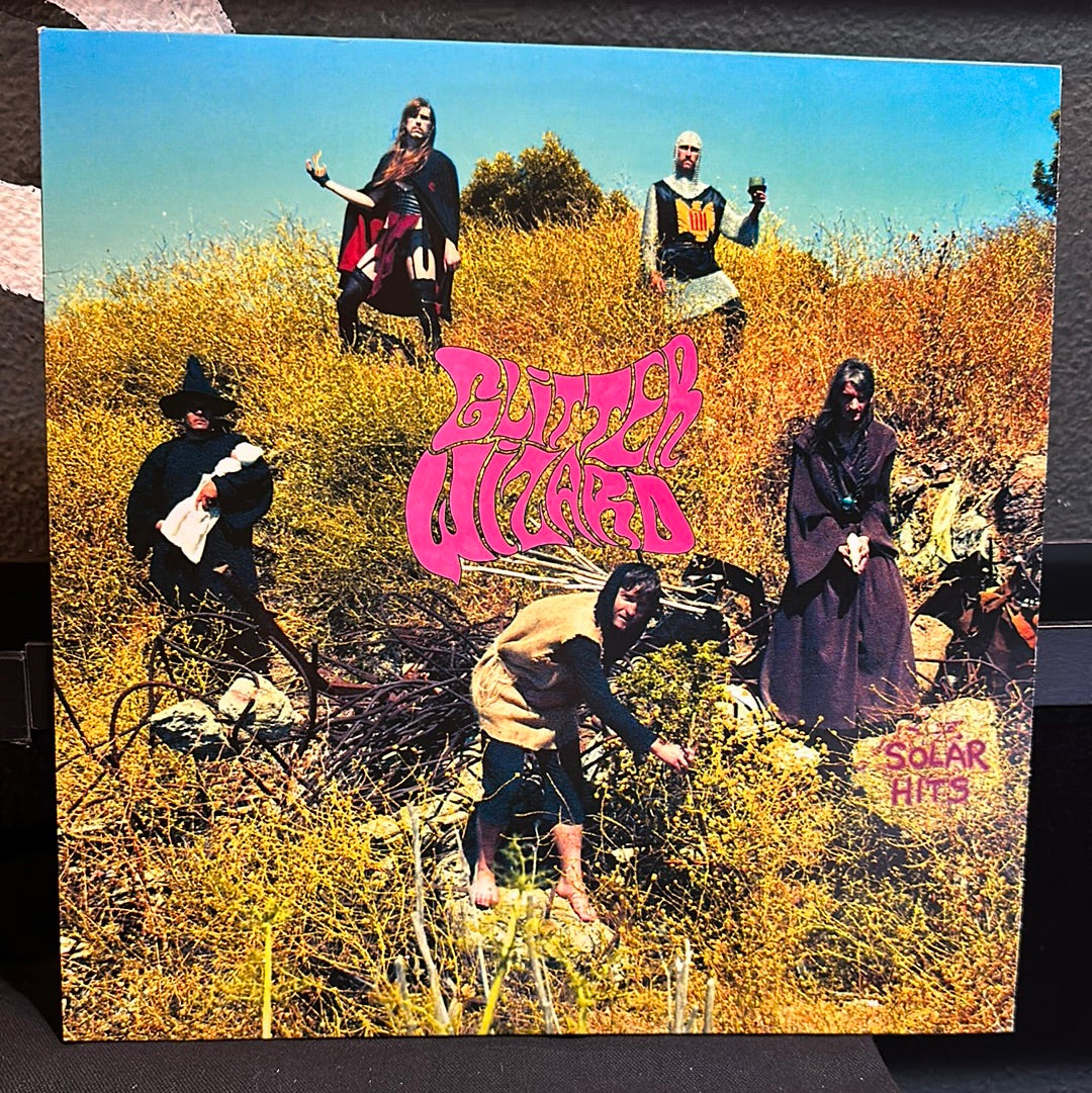 Used Vinyl:  Glitter Wizard ”Solar Hits” LP (Pink vinyl)