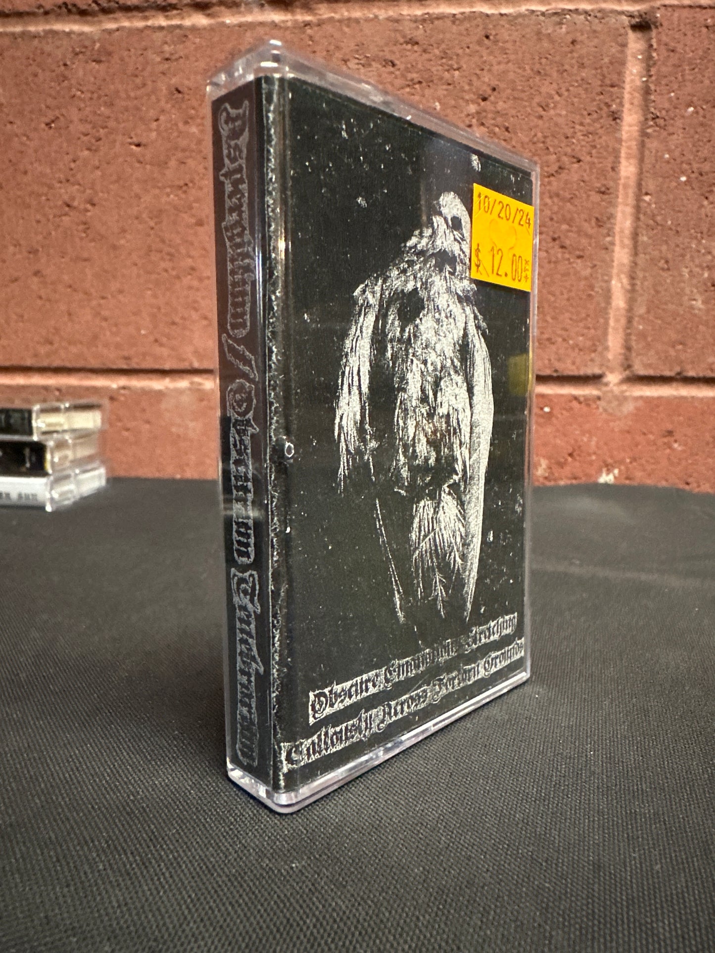 Used Cassette: Aspergillum / Obscurum Tenebrarum "Obscure Emanations Stretching Callously Across Forlorn Grounds" Tape