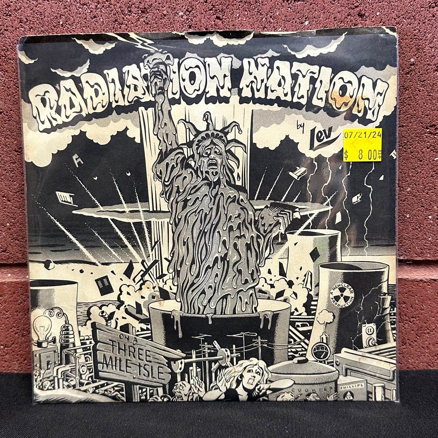 Used Vinyl:  Mark A. Levy, Rick Kirby And The Vigilantes ”Radiation Nation On A 3-Mile Isle / Overexposed” 7"