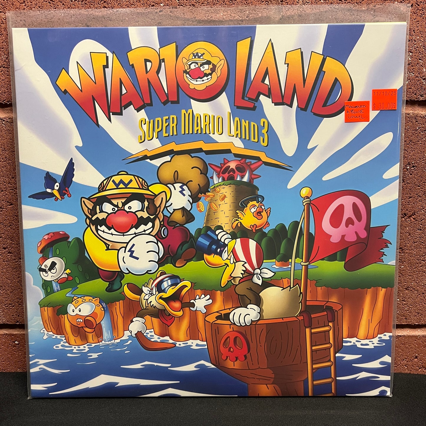 Used Vinyl: Ryoji Yoshitomi & Kozue Ishikawa "Wario Land: Super Mario Land 3" LP (Blue & Magenta Vinyl)
