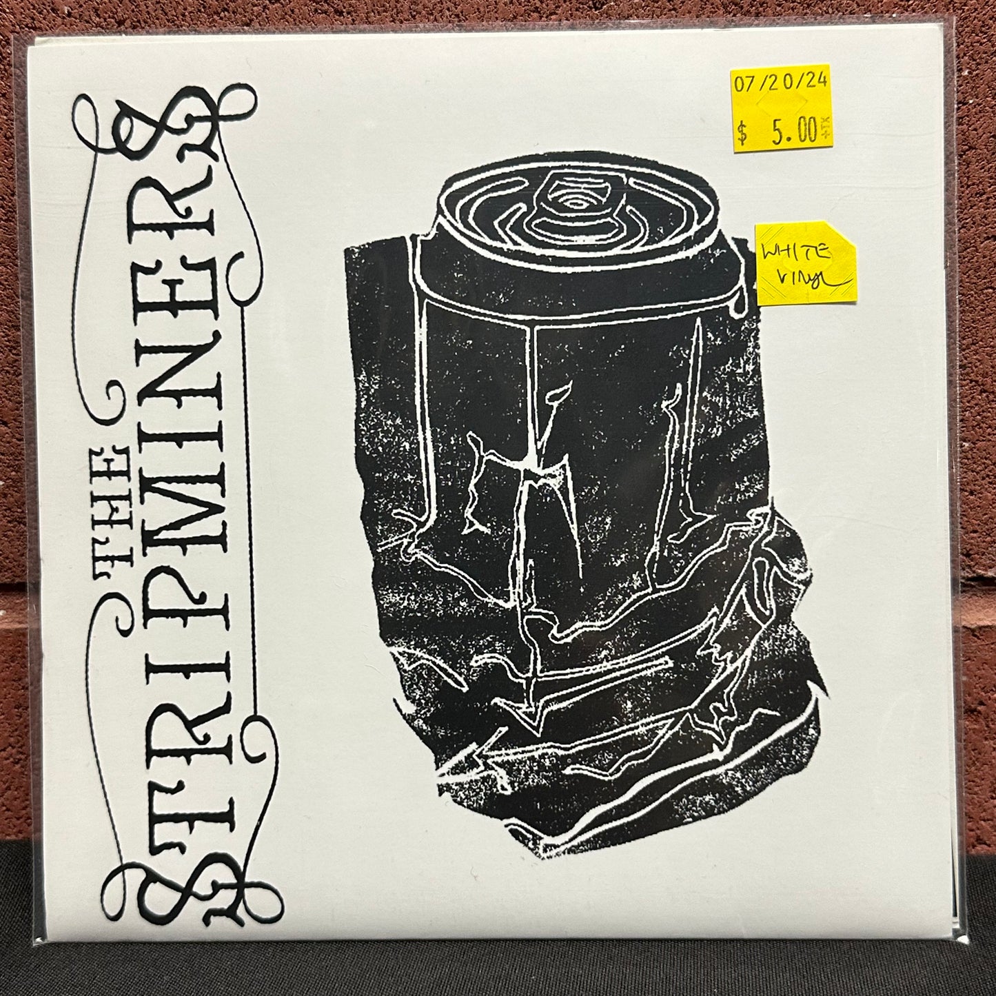 Used Vinyl:  The Stripminers ”Movies” 7" (White vinyl)