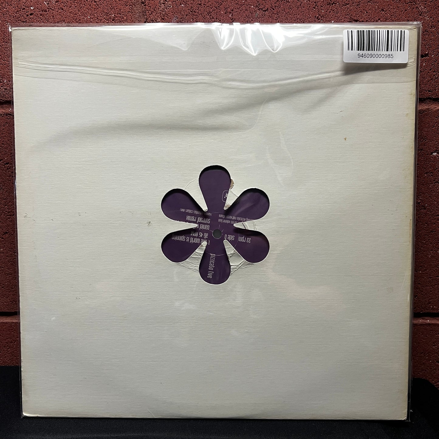 Used Vinyl: Pizzicato Five "Trailer Music / The World Is Spinning At 45 RPM" 12" EP (1997 Japanese Press)