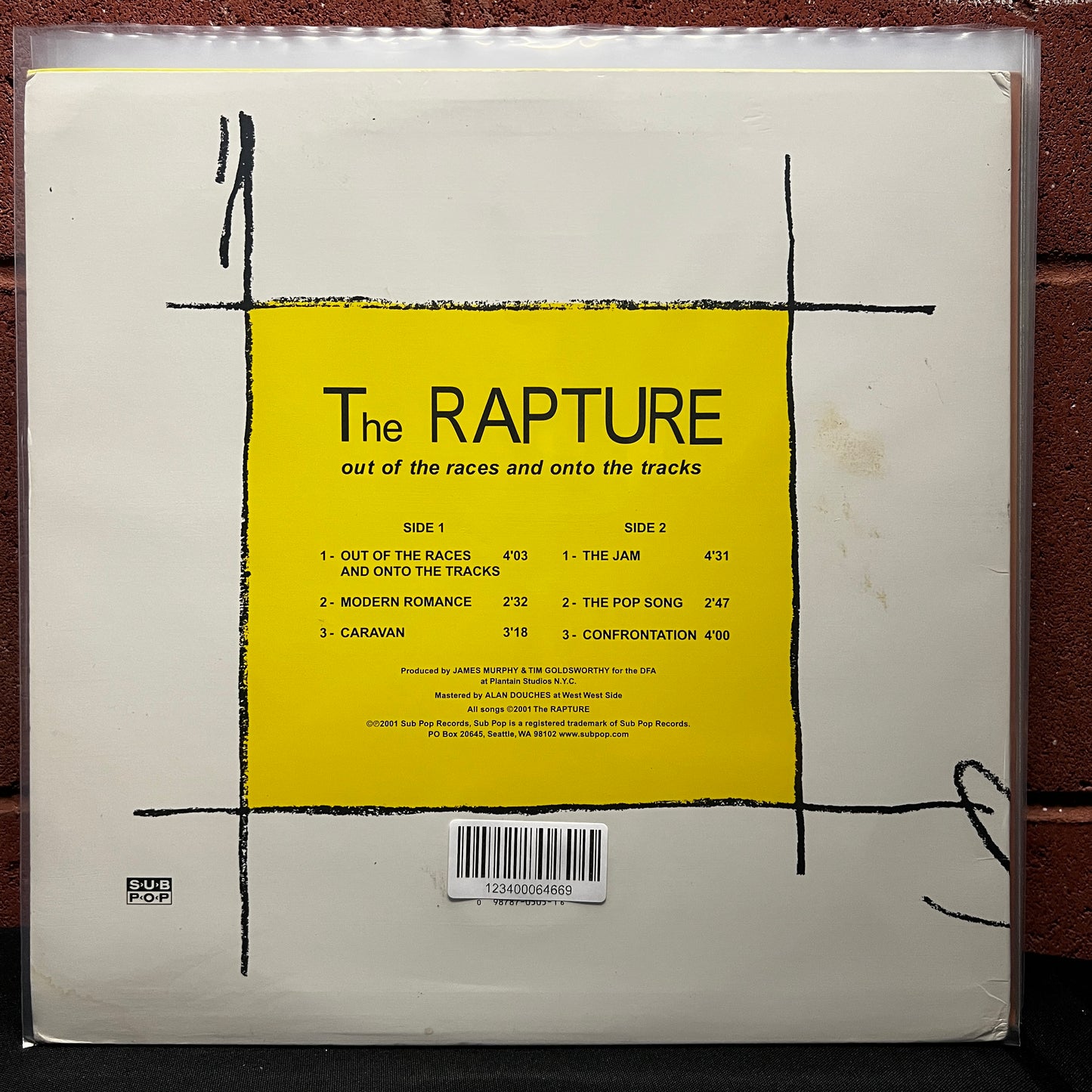 Used Vinyl: The Rapture "Out Of The Races And Onto The Tracks" 12" (White Vinyl)