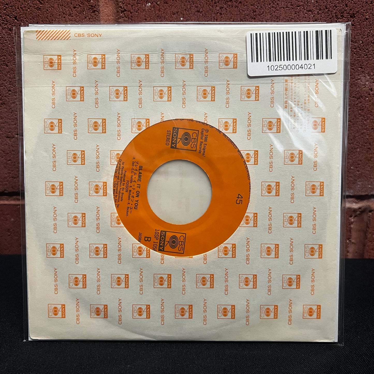 Used Vinyl: Poison "I Won't Forget You / Blame It On You" 7" (Poster Sleeve Japanese Issue w/ Sticker sheet)