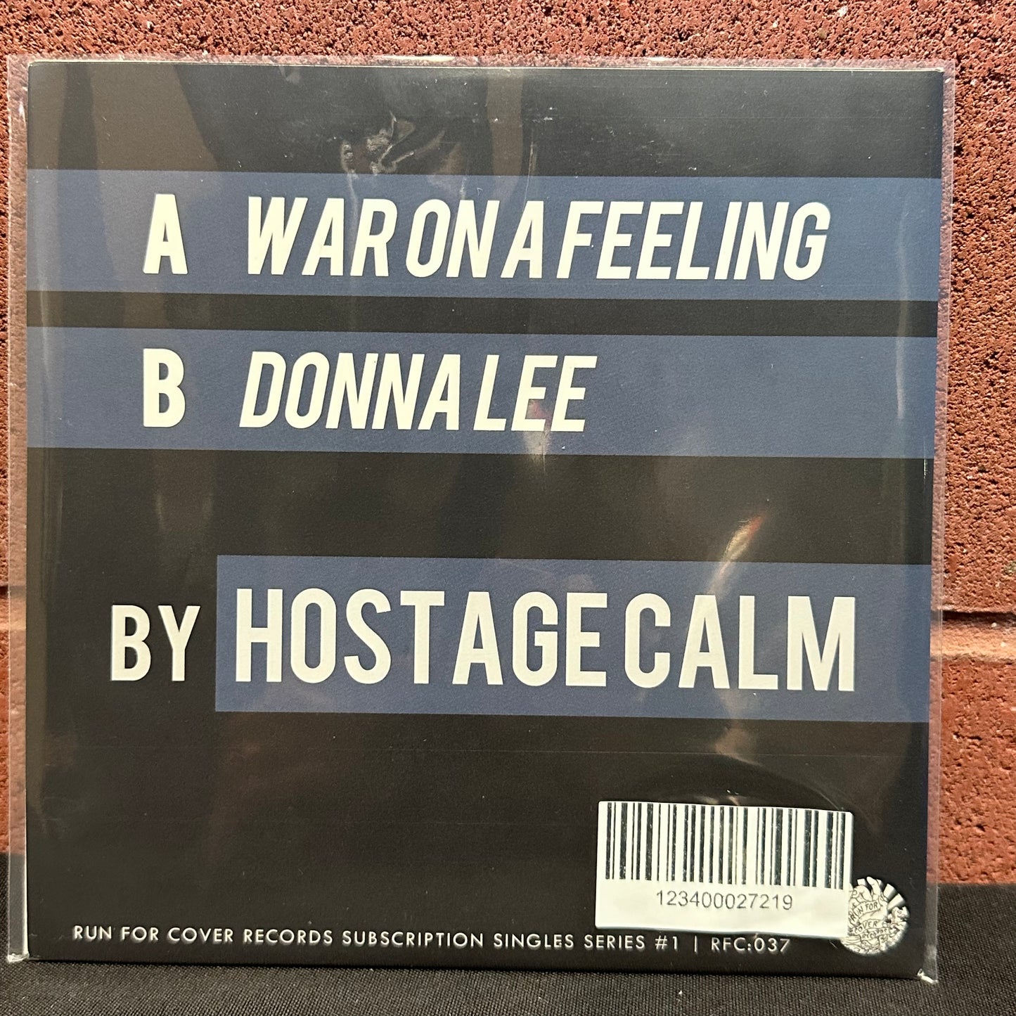 Used Vinyl:  Hostage Calm ”War On A Feeling / Donna Lee” 7"