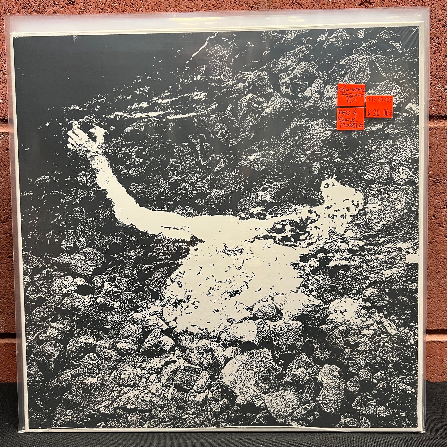 Used Vinyl: Sinister Feeling "S/T" 12" (Red & Black Marble Vinyl)