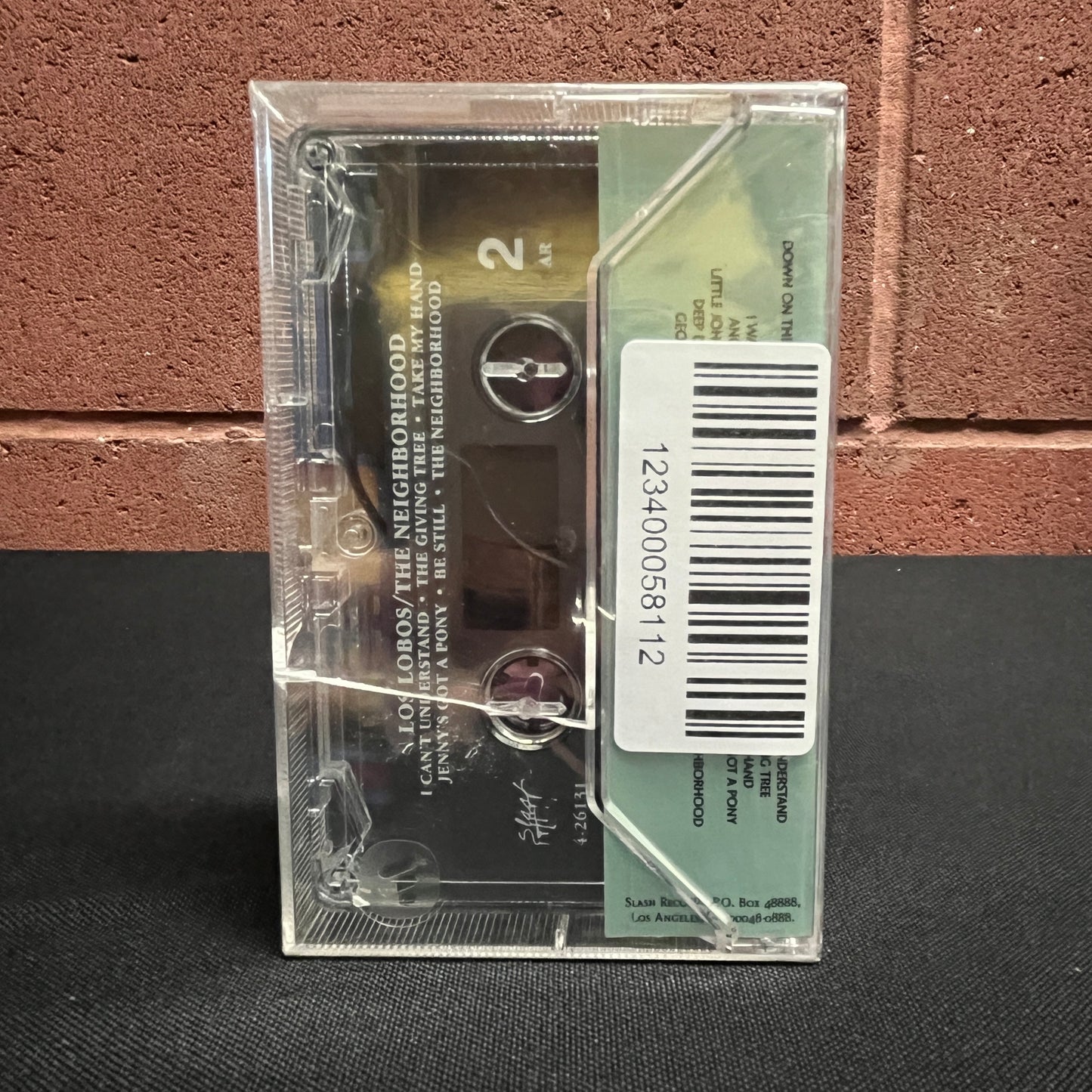 Used Cassette: Los Lobos "The Neighborhood" Tape (Sealed 1990 pressing)