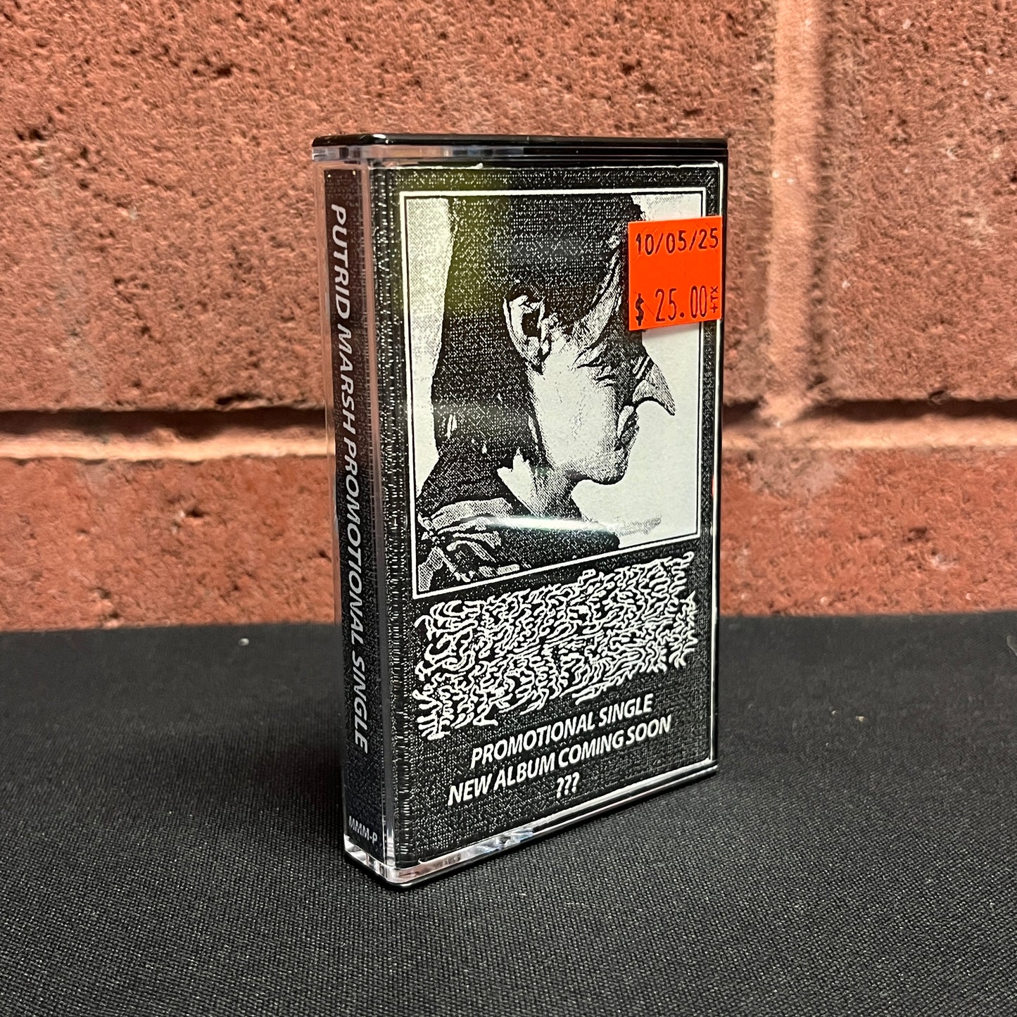 Used Cassette: Putrid Marsh "Souls Mired In The Den Of Evil" Tape
