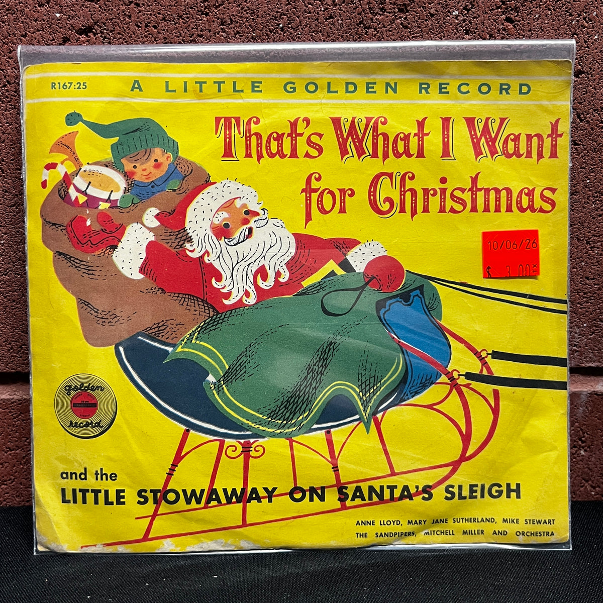 Used Vinyl: Anne Lloyd, The Sandpipers "That's What I Want For Christmas" 6" (Yellow vinyl)