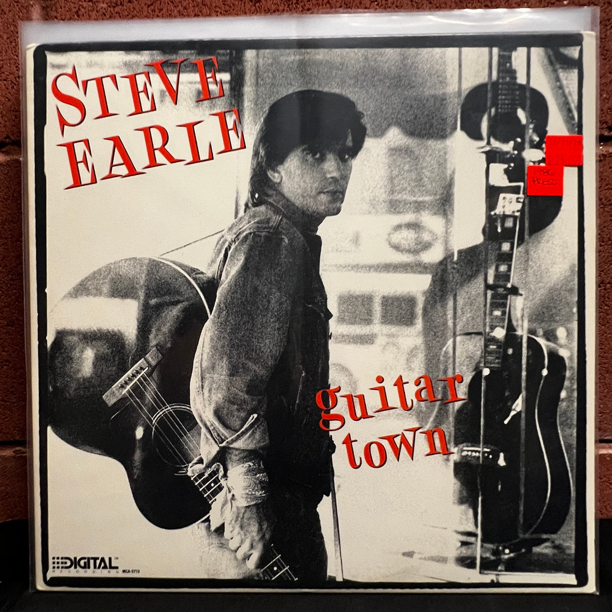 Used Vinyl: Steve Earle ‎"Guitar Town" LP (1986 Press)