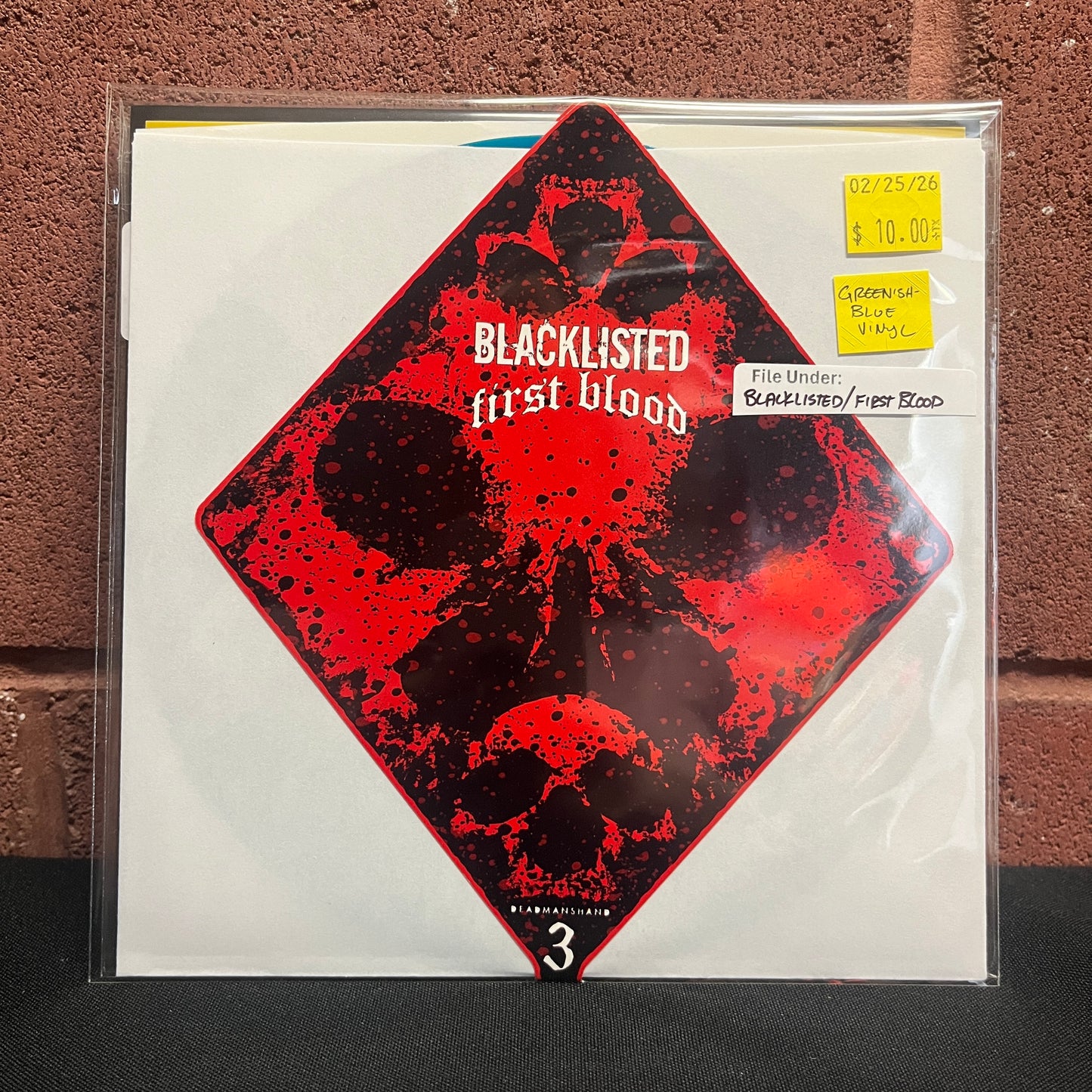 Used Vinyl: Blacklisted / First Blood "Dead Man's Hand (Split)" 7" (Greenish-Blue vinyl)