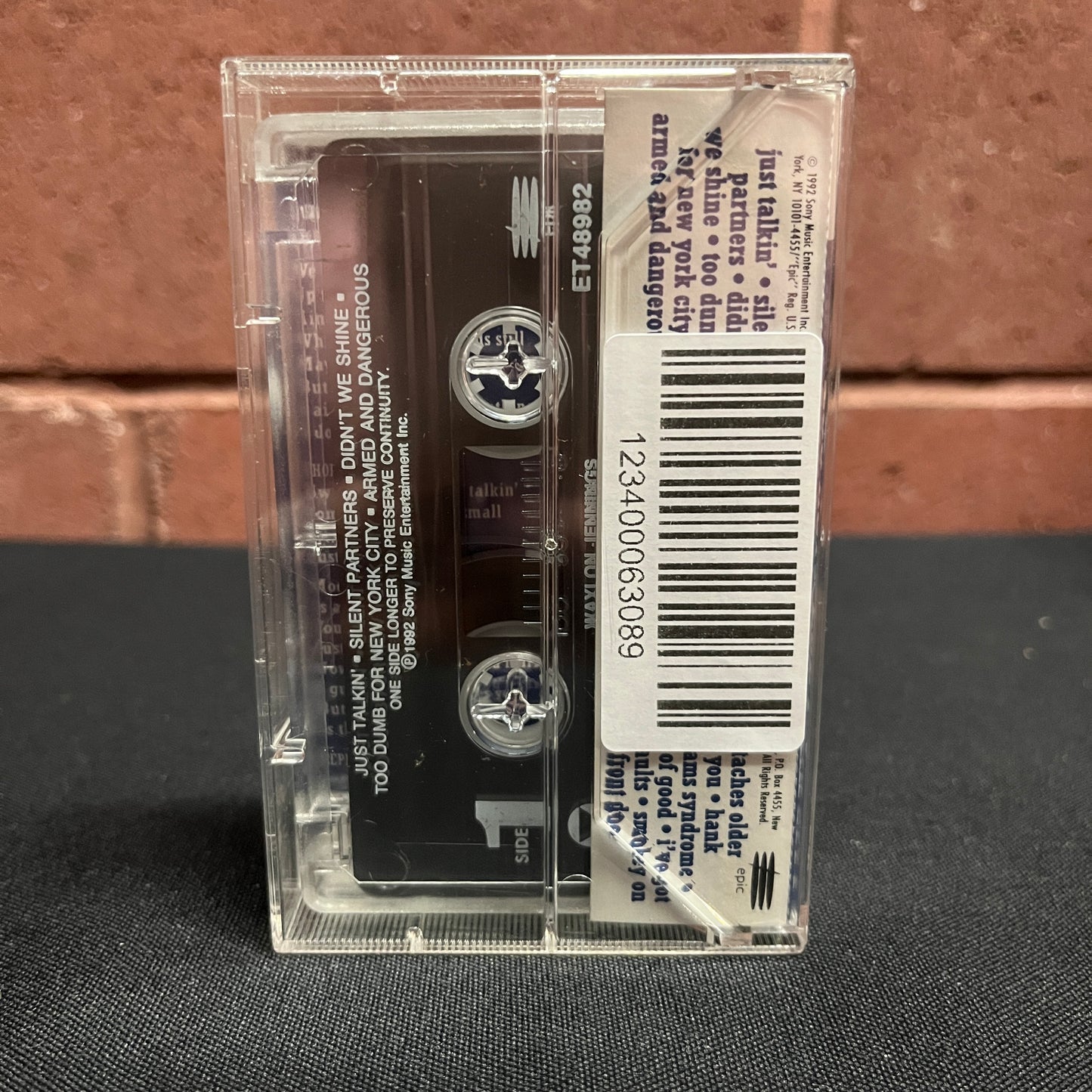 Used Cassette: Waylon Jennings "Too Dumb For New York City, Too Ugly For L.A." Tape