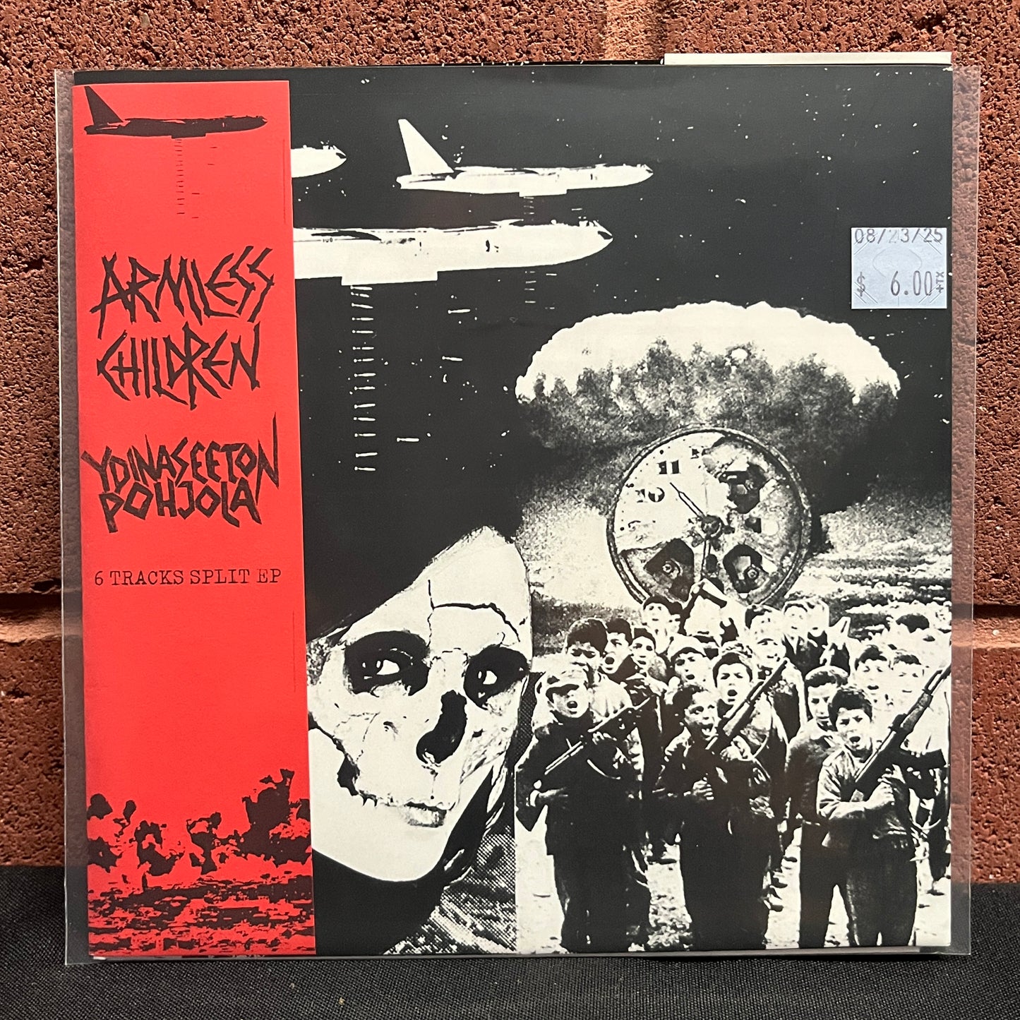 Used Vinyl: Armless Children / Ydinaseeton Pohjola "Split" 7" (Red Vinyl)