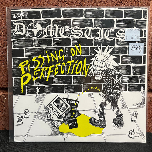 Used Vinyl: The Domestics "Pissing On Perfection" 7" (Clear w/Yellow Splatter Vinyl)