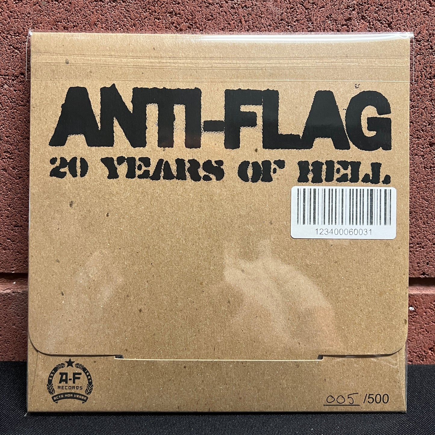 Used Vinyl: Anti-Flag / Worship This! "20 Years Of Hell: Vol. III" 7" (Yellow vinyl, Numbered)