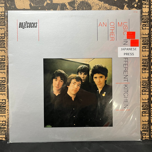 Used Vinyl: Buzzcocks "Another Music In A Different Kitchen" LP (White Label Promo Japanese Press)