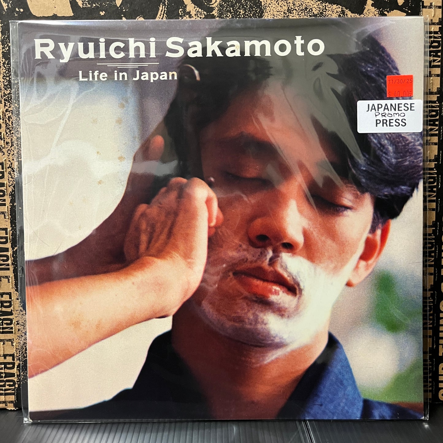 Used Vinyl: Ryuichi Sakamoto "Life In Japan" 12" (Japanese Promo Only Release, Translucent Black Vinyl)