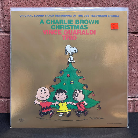 Used Vinyl: Vince Guaraldi "A Charlie Brown Christmas" LP (2022 Reissue, Embossed Foil Cover)