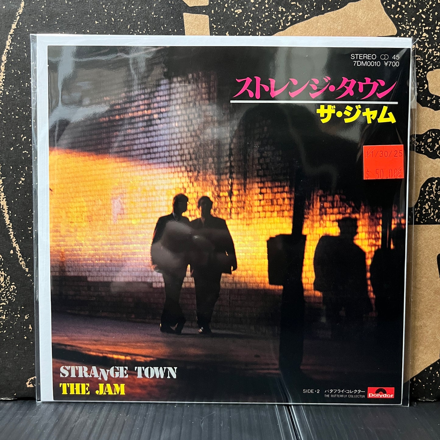 Used Vinyl: The Jam "Strange Town / The Butterfly Collector" 7" (Japanese Press Paper Labels)