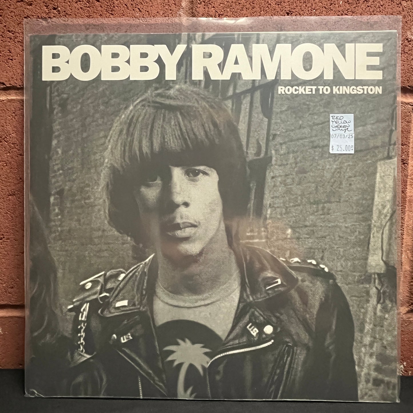 Used Vinyl: Bobby Ramone "Rocket To Kingston" LP (Red w/Yellow & Green Splatter Vinyl)