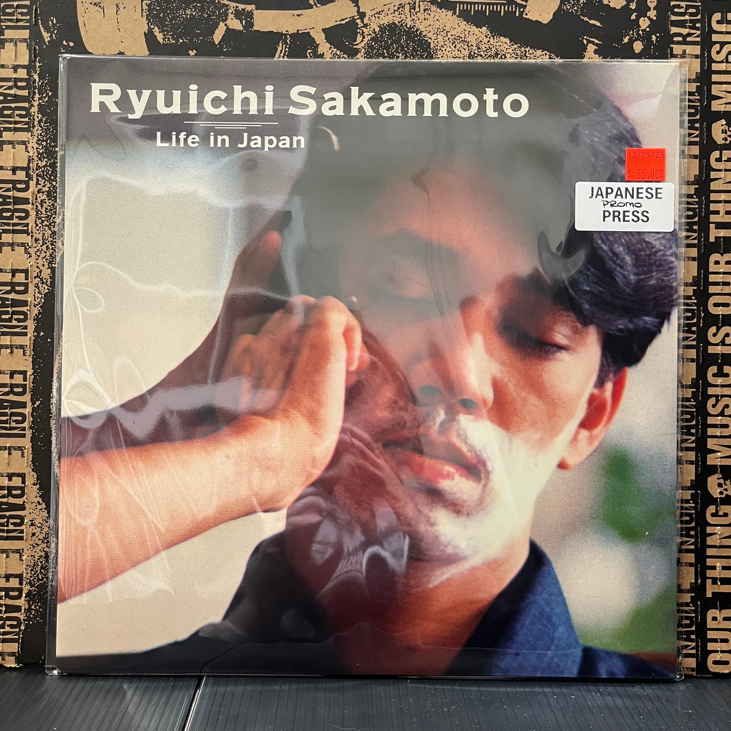 Used Vinyl: Ryuichi Sakamoto "Life In Japan" 12" (1982 Japanese Promo, Translucent Black Vinyl)