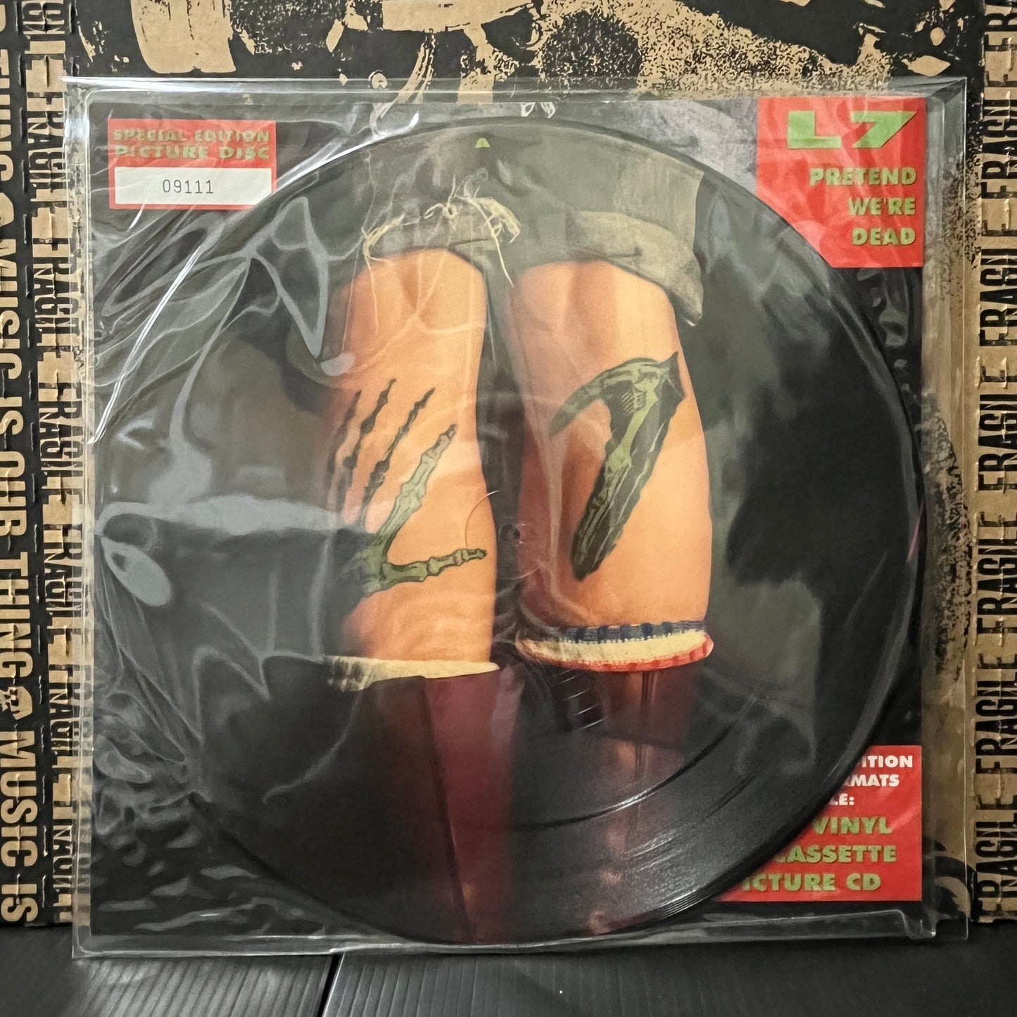 Used Vinyl: L7 "Pretend We're Dead" 12" EP (Numbered Picture Disc Press)