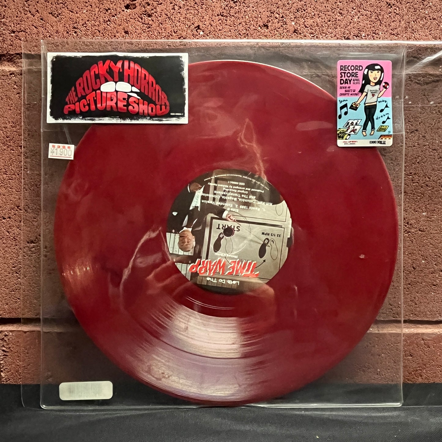 Used Vinyl: The Rocky Horror Picture Show "(Let's Do) The Time Warp" 10" (2015 RSD Japan Release, Marbled Red Vinyl w/ Disk Union Hype Sticker)