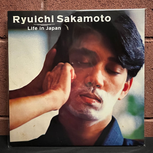 Used Vinyl: Ryuichi Sakamoto "Life In Japan" 12" (1982 Japanese Promo, Translucent Black Vinyl)