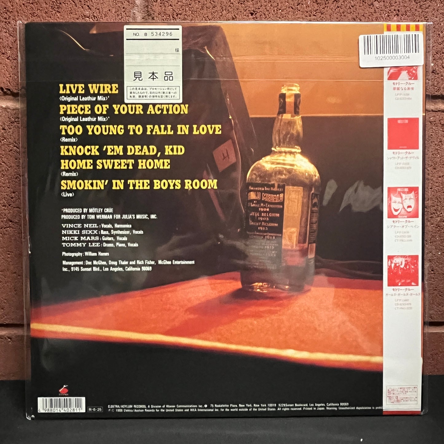 Used Vinyl: Motley Crue "Raw Tracks" 12" (1988 Japan Only Release Promo)