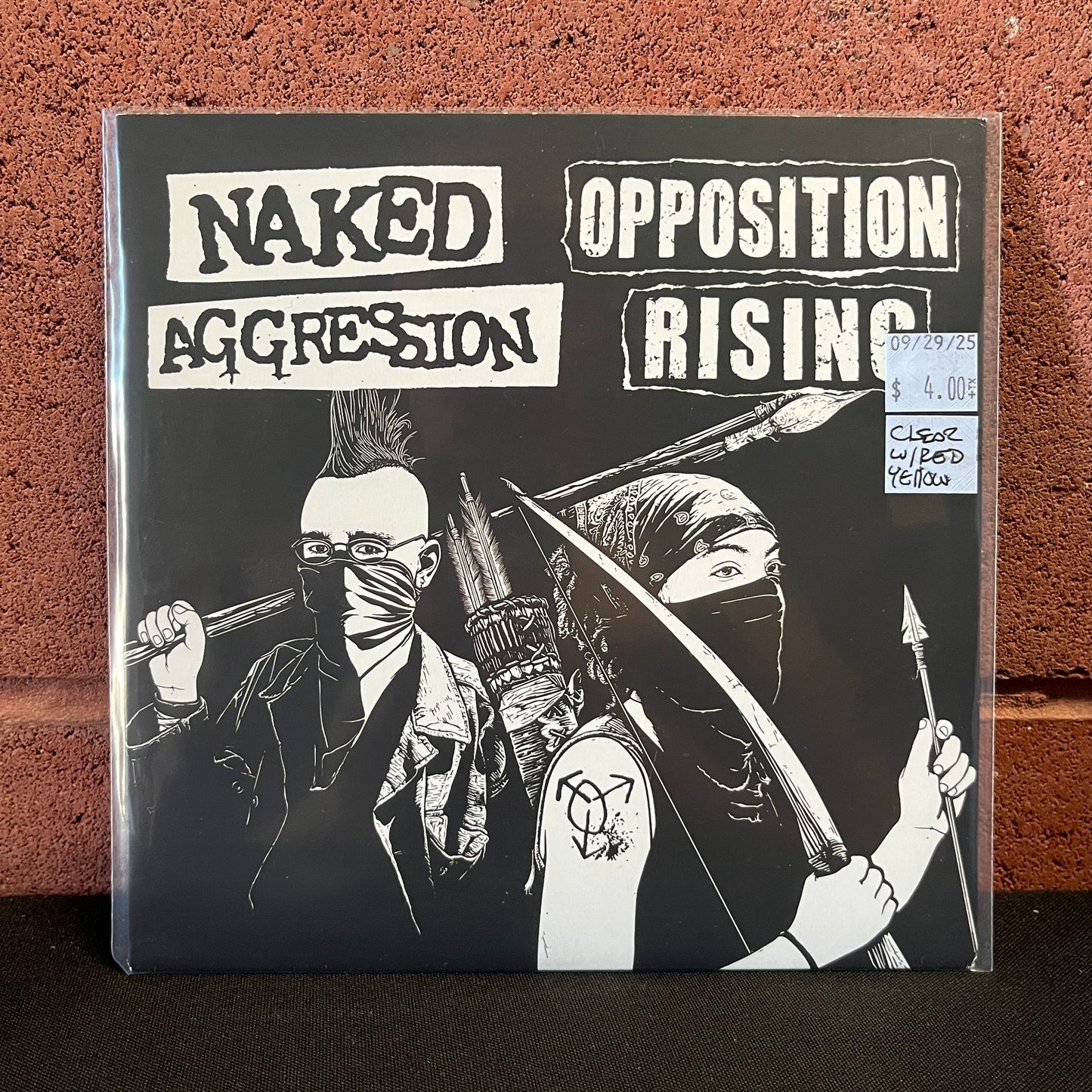 Used Vinyl: Naked Aggression / Opposition Rising "Split" 7" (Clear w/Red & Yellow Splatter Vinyl)
