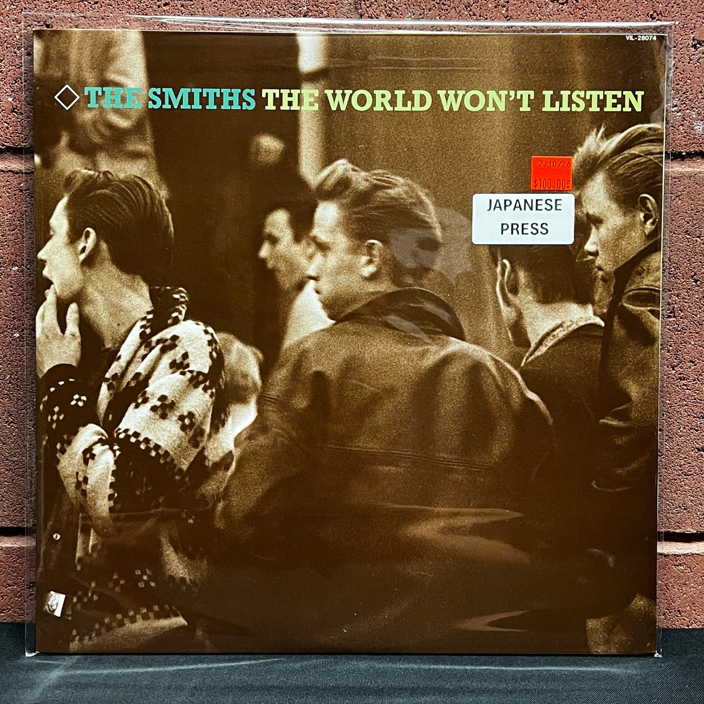 Used Vinyl: The Smiths "The World Won't Listen" LP (1987 Japanese Issue)