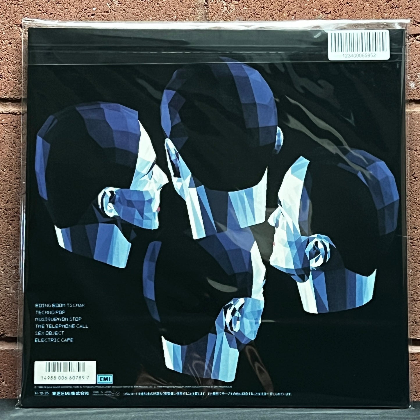 Used Vinyl: Kraftwerk "Electric Cafe" LP (1986 Japanese Issue)