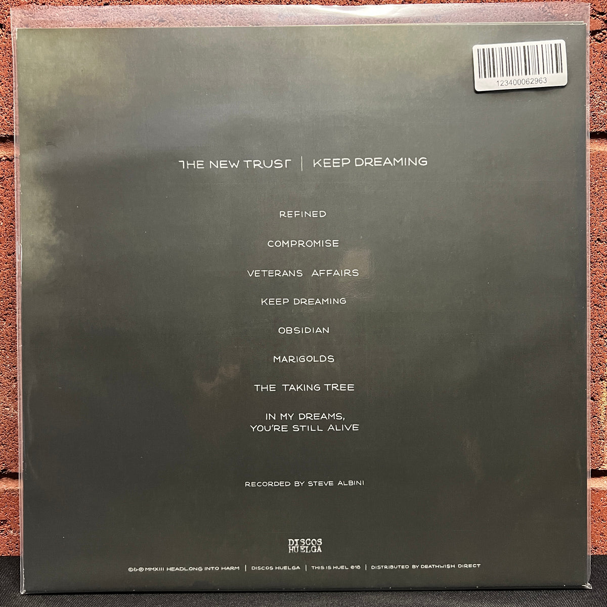 Used Vinyl: The New Trust "Keep Dreaming" LP (Red vinyl)
